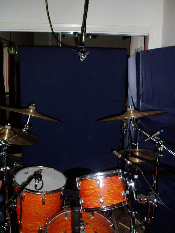 Stereo ribbon mic placed over a drum kit